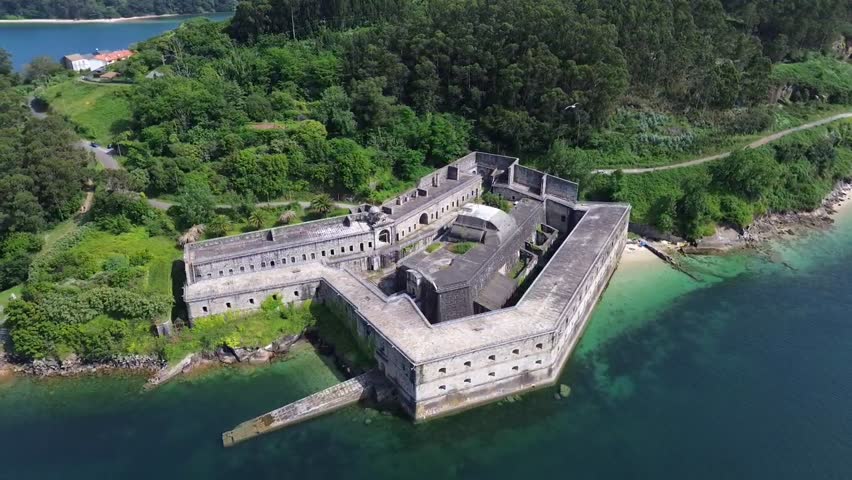 Aerial drone footage of Palma Castle Spain coastal fortress overlooking the Ferrol estuary in Galicia