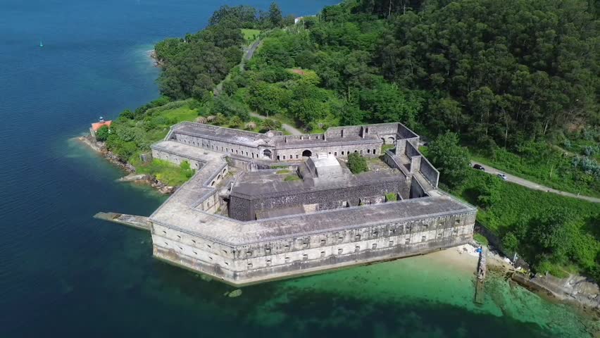 Aerial drone footage of Palma Castle Spain coastal fortress overlooking the Ferrol estuary in Galicia
