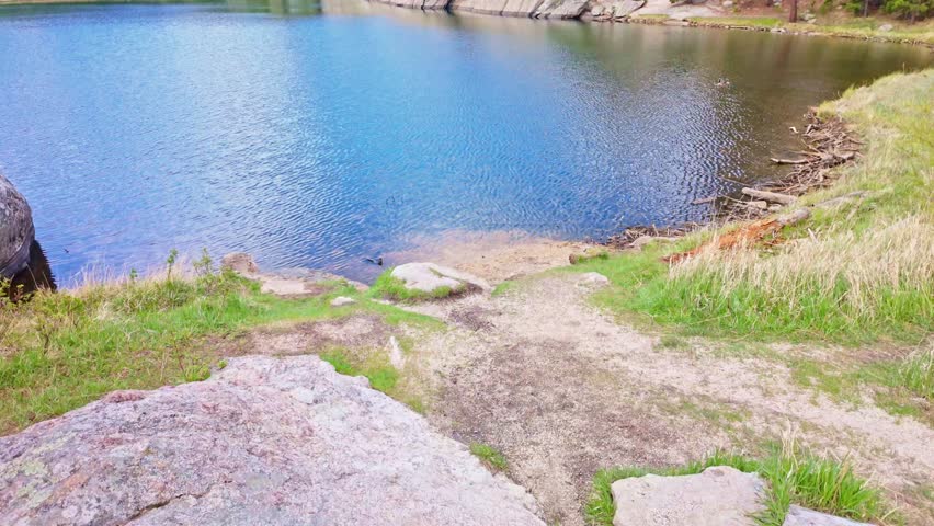 Scenic view of the Sylvan Lake Shore Trail with Maverick Cliffs in Custer State Park South Dakota