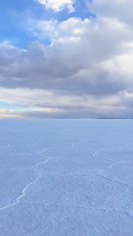 Scenic vertical drone landscape over Uyuni salt flats Bolivia