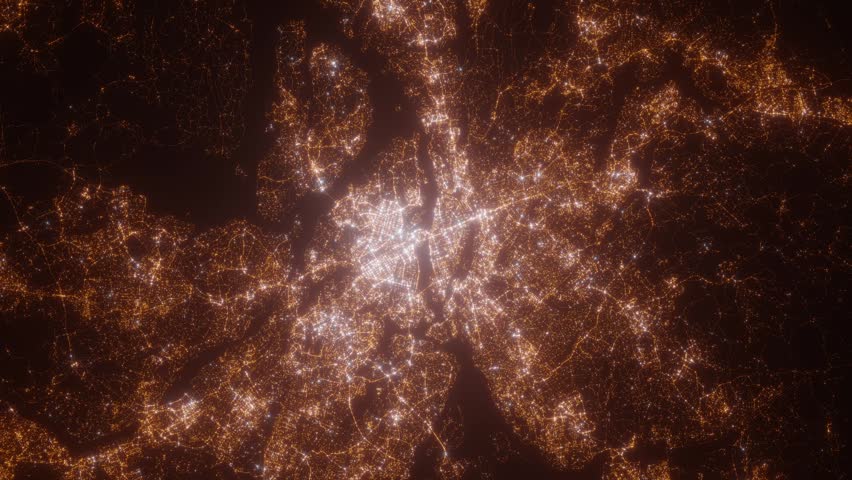 Stockholm (Sweden) aerial view at night. Top view on modern city with street lights. Camera is zooming out, rotating counterclockwise. Vertical video. The north is on the left side