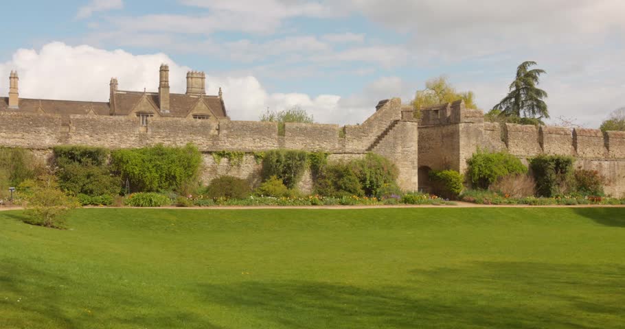 Historic City Wall And New College Garden At The University Of Oxford In England, United Kingdom. - wide shot