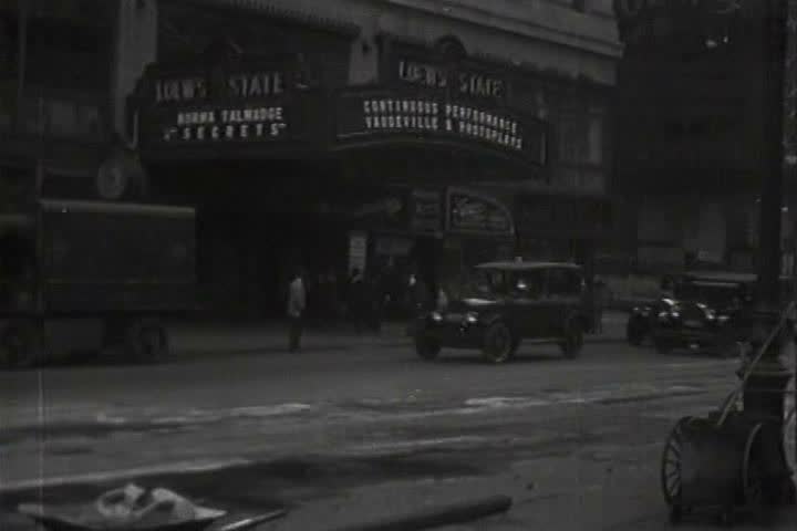 1920s - Rough shots of New York city in 1920s well as parades of cars and trucks in London, Canada and across the US.