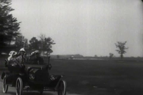1910s - 1917 military parade during World War One and other uses of the Model T. Stock Video