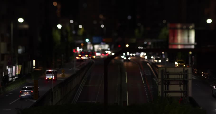 A night cityscape of miniature traffic jam at the downtown street in Tokyo