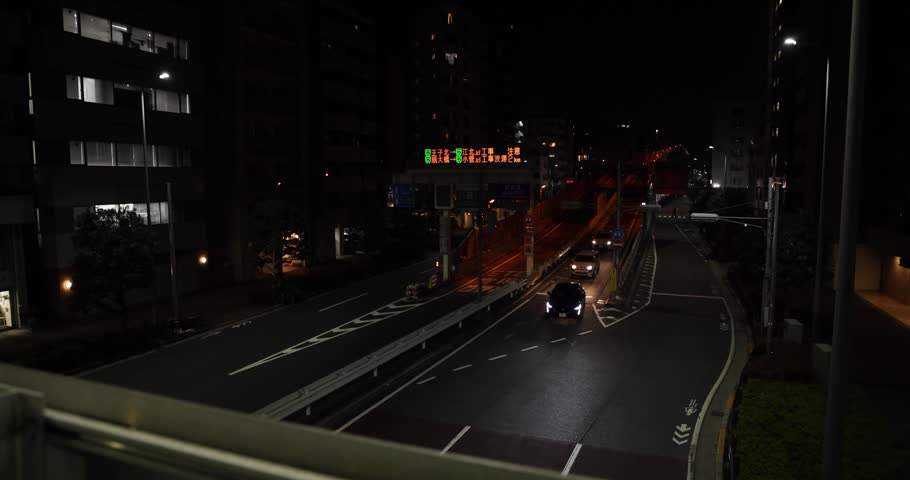 A night cityscape of traffic jam near the expressway in Tokyo wide shot