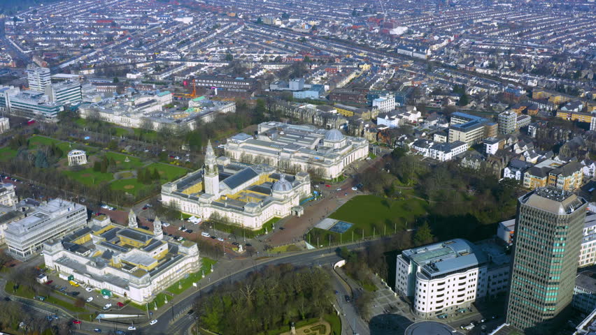 Aerial drone view of Cardiff Civic Centre, Wales, showing Cardiff City Hall, the National Museum of Wales dome, Cathays Park, and surrounding residential areas in winter.
