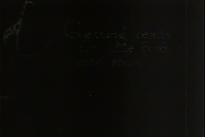 1920s - Making a dollhouse in a doll making factory in 1920.