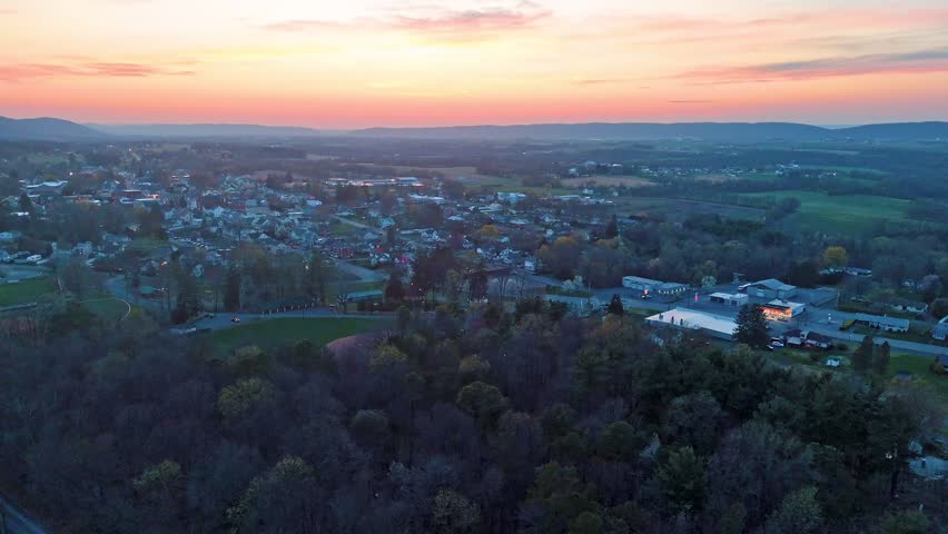 Aerial view of rural town and valley near Dalmatia Pennsylvania at sunset