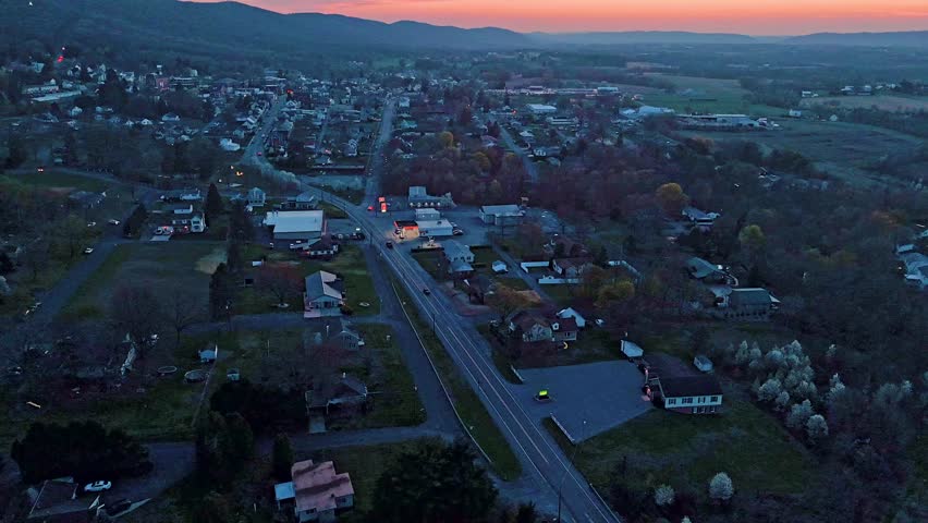 Aerial view of residential road and houses near Dalmatia Pennsylvania at dusk