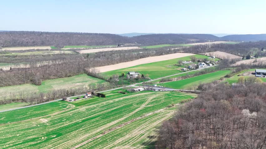Aerial view of farmland valley and scattered houses near Herndon Pennsylvania