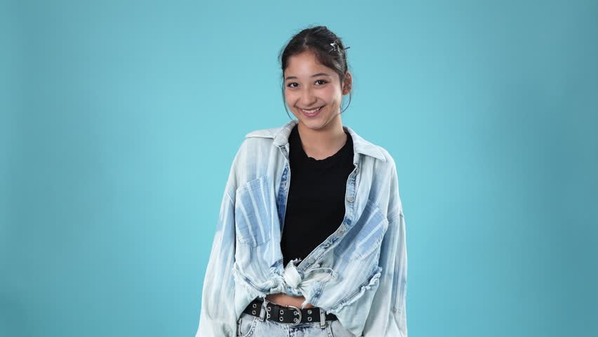 Young girl looking around and smiling