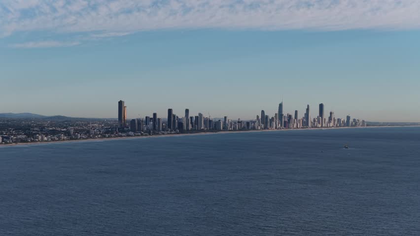 Static aerial view of the Surfers Paradise skyline across the ocean on the Gold Coast, Queensland, Australia