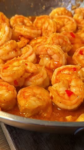 Pan-seared Prawns Coated In A Savory, Aromatic Sauce With Vegetable Salad. - vertical, closeup shot