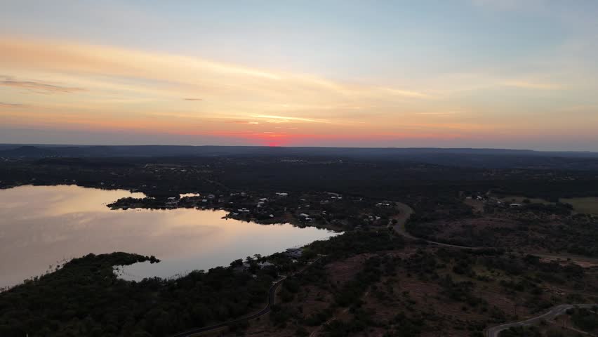 High altitude view of Texas hill country during sunrise in the summer with Lake Buchanan in view