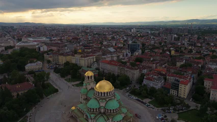 Sofia city Bulgaria capital at sunset Aerial drone cityscape with cathedral