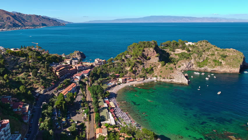 Small Scenic Island Of Isola Bella In A Bay On The Ionian Sea Near Taormina, Sicily, Italy. Aerial Drone Shot