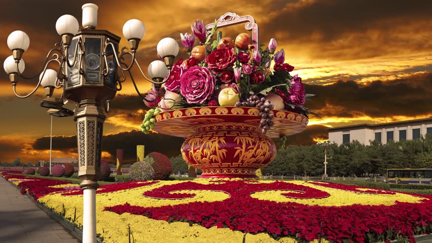 Street lamp and huge flower basket (against the sunset) in Tiananmen square, Beijing, China. 4K, time lapse 