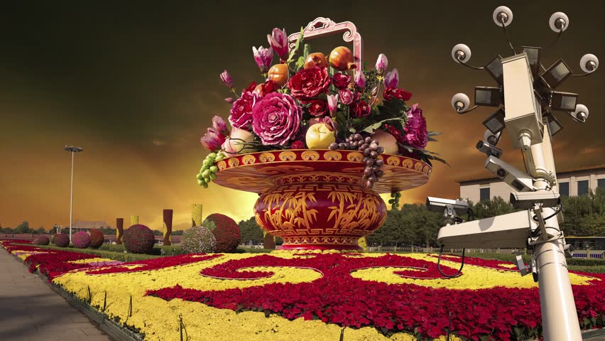 Street lamp and huge flower basket (against the sunset) in Tiananmen square, Beijing, China. 4K, time lapse 