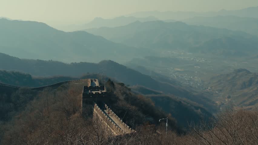 Beijing The Great Wall of China elevated stone walkway overlooking lush mountain valley