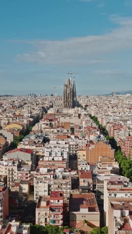 Eixample Barcelona aerial city blocks green courtyards rooftops grid pattern urban planning drone background spain vertical