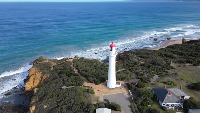 Aerial view Aireys Inlet Lighthouse Australia. Beautiful nature landscape lighthouse on top of a cliff, travel and tourism on the southern ocean coast in Victoria.