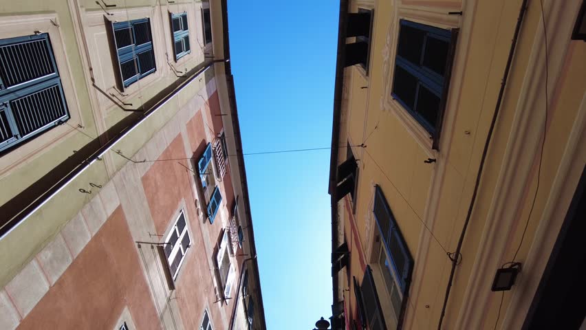 Europe, Italy , Liguria, 06,27,2026   Santa Margherita Ligure close to Portofino is a colorfull sea village tourist attraction destination for summer holidays - typical colorful houses with a view of the sky