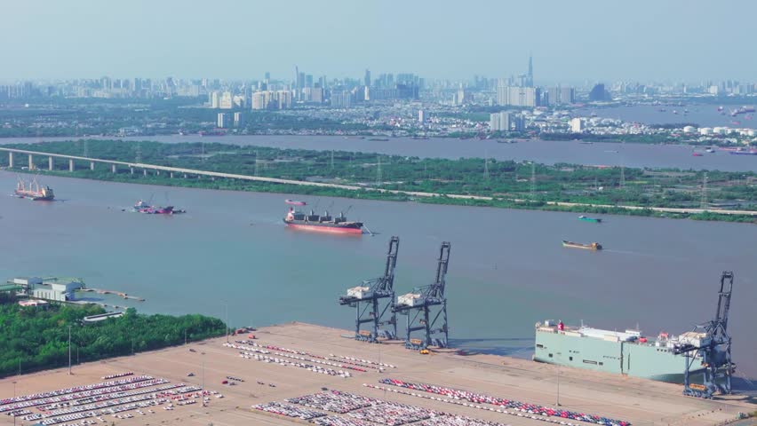 Aerial View of Cargo Port and Logistics Terminal Along Saigon River in Ho Chi Minh City Vietnam