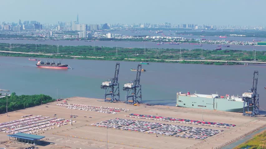 Drone View of Cargo Ships and Logistics Port Along Saigon River in Ho Chi Minh City Vietnam
