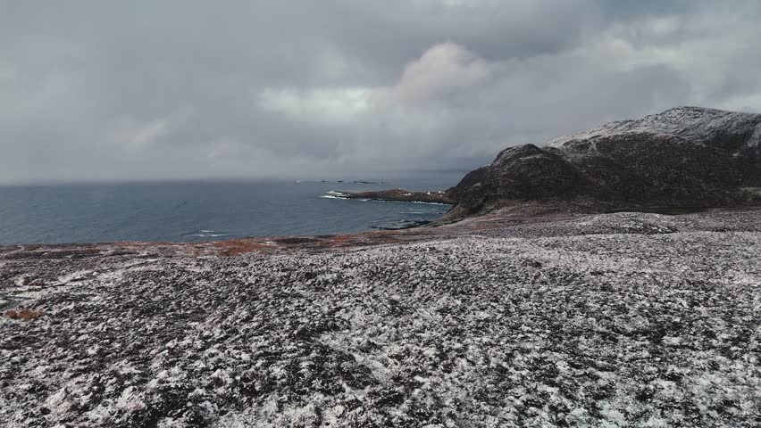Aerial view of a mountain plateau with melting snow