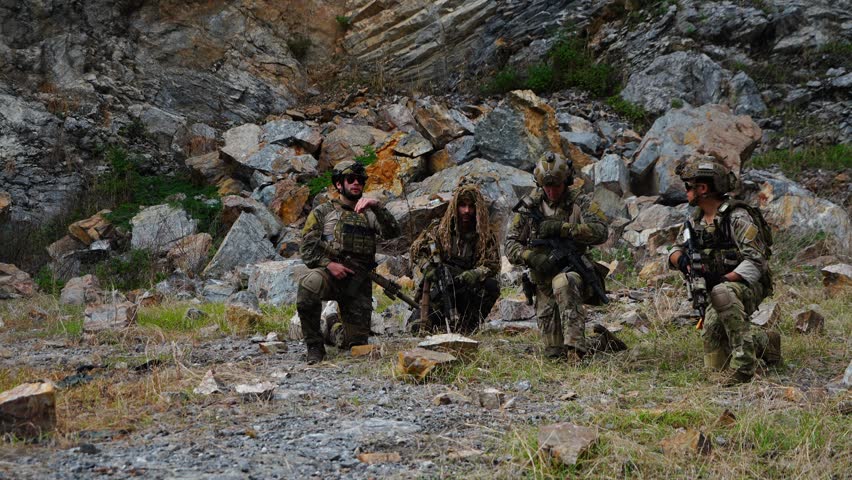 ชื่อ
A group of soldiers in military uniforms carrying BB guns were randomly attacked and taken down during a military exercise while playing a game. 