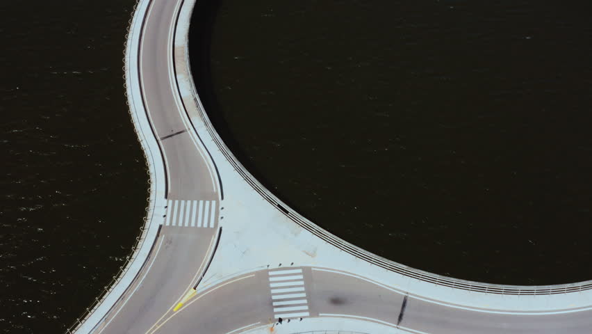 Panoramic Drone Shot of Laguna Garzón Bridge Roundabout Over Lagoon