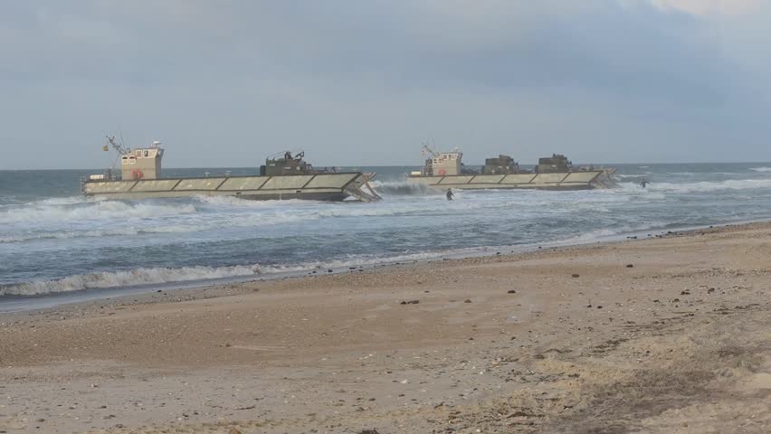 Marines carry carts from the sea to the land, 06.29.2026.