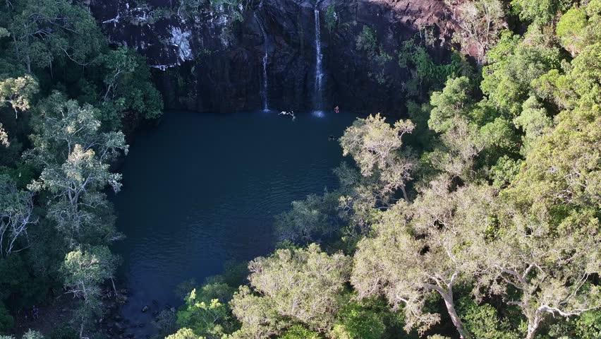 Spectacular aerial footage of Cedar Creek Falls near Airlie Beach Queensland Australia