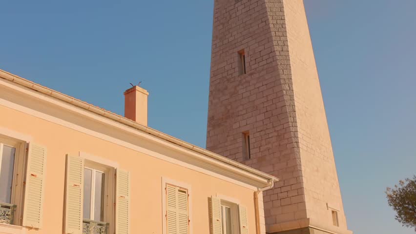 Looking Up On Saint-Jean Cap Ferrat Lighthouse In France. - tilt up shot