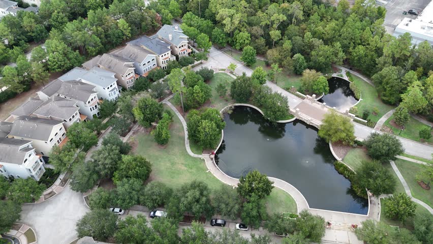 Aerial view of luxury houses next to a small park, Woodlands, Houston, Texas, USA	
