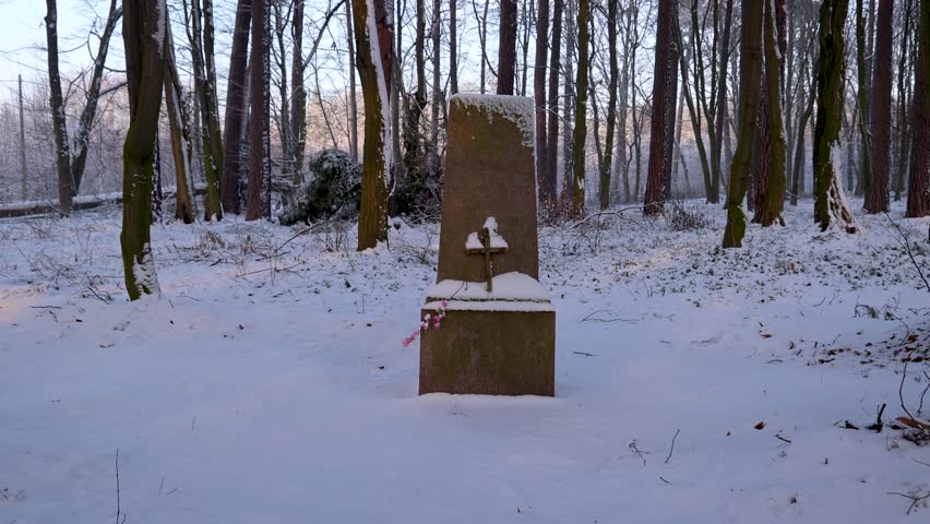 German memorial stone o a war cemetery in Rogow village, Lodz Province, Poland, 4k