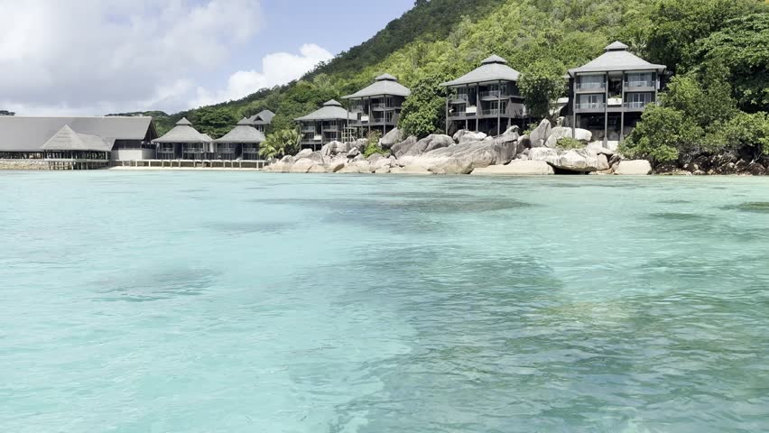 Luxury villas overlooking the turquoise sea of Praslin, Seychelles