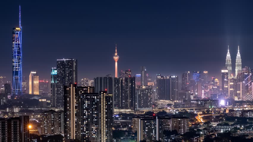 Birds Eye View panoramic view of Kuala Lumpur tower fireworks time lapse during the evening