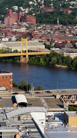 Cars driving over a bridge along the Monongahela River in Pittsburgh Pennsylvania USA