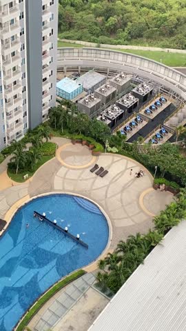 Scenic balcony view of modern residential towers and apartment buildings in a metropolitan city, Jakarta, Indonesia.