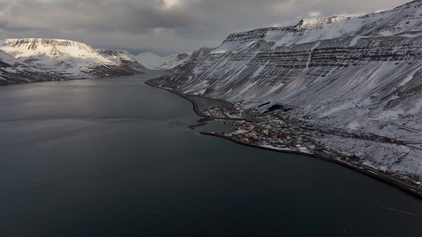 Steep, Snow-covered Mountains Surrounding Sugandafjordur In Westfjords, Iceland. - aerial shot