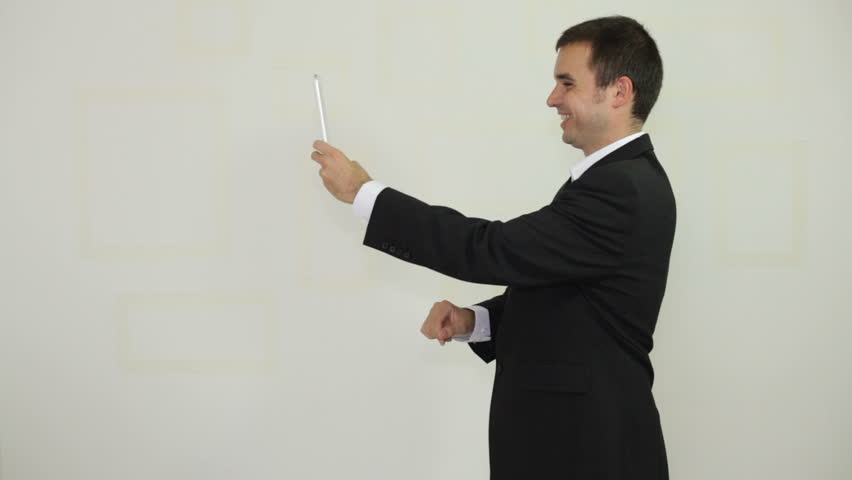 Businessman taking photo with electronic tablet and laughing