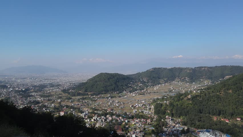 Scenic Aerial View of Small Hills and Rural Settlements in a Peaceful Valley