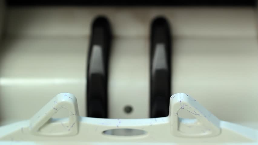 Eurozone Inflation and Central Bank Monetary Policy Concept with Cash Counter. Frontal close-up with selective focus of an electronic money counter processing 500 euro bills. Ideal footage for stories on high-finance inflation, central banking systems, cash auditing, financial corruption, or corporate revenue growth.
