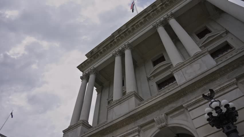 Looking up view and pan across the Pennsylvania State Capitol in Harrisburg showcasing historic government architecture civic landmark details and state government symbolism.