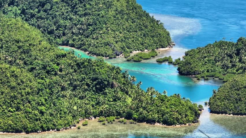 Greenish sea water lagoon in Tinago Island. Philippines. Zoom view.