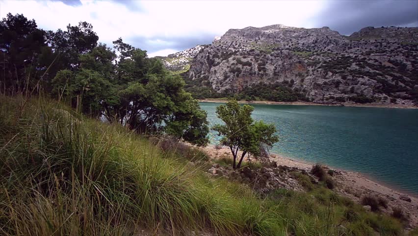 Colorful Lake Gorg Blau - View of Panta de Gorg Blau lake - Mallorca Island, Balearic Islands, Spain - 22.05.2024