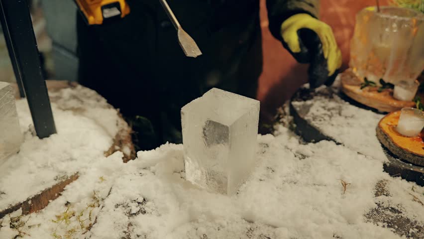 Precision drilling transforms crystal ice cube into unique serving glassware