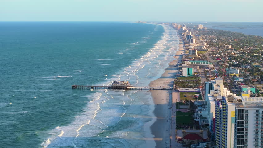Daytona Beach city, Florida. Main Street Pier with surrounding luxury hotels and condos as part of the city